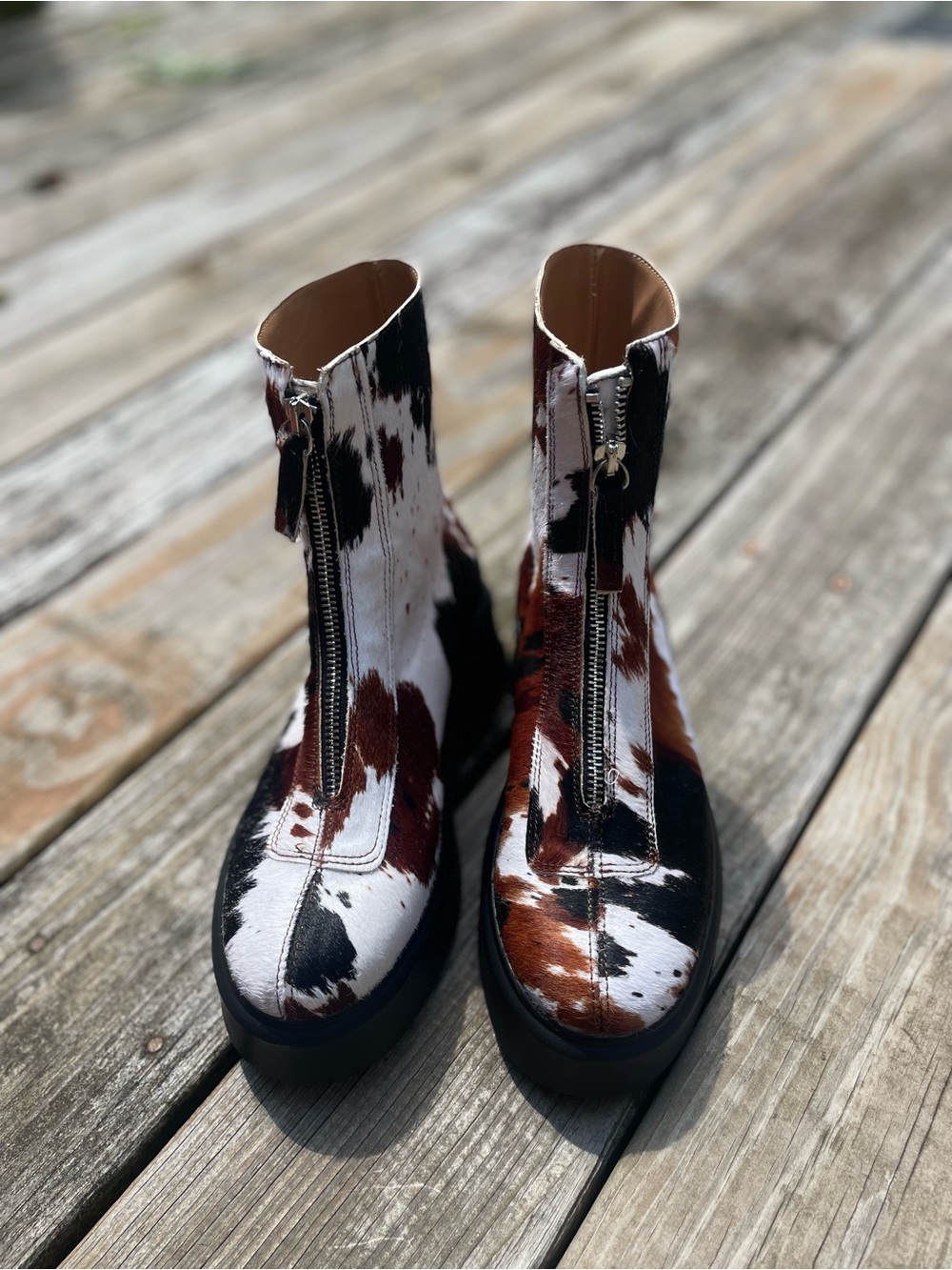 Steve Madden Cowhide Front-Zip Ankle Boots in Black, White & Brown